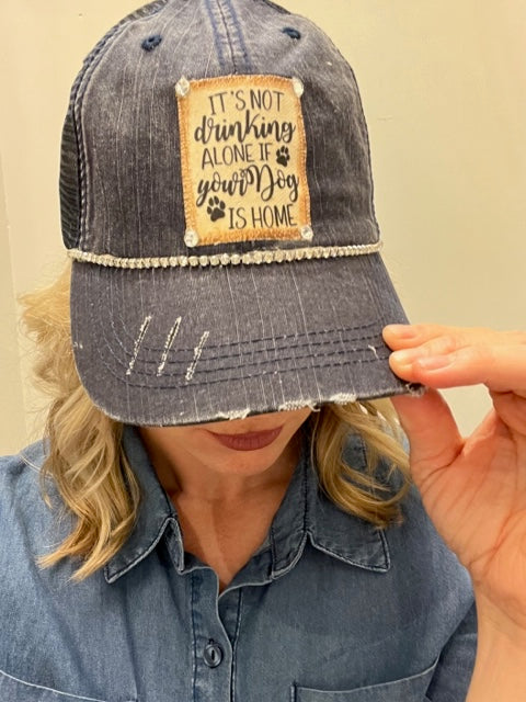 Jana's Bling Trucker Hat - "It's not drinking alone if your dog is home"